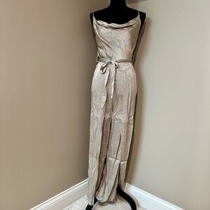 Women’s size small metallic jumpsuit with split leg detail, cowl neck, tie waist
